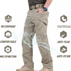 Beige tactical pants with water splashes on a white background, featuring JIN EAGLE branding.