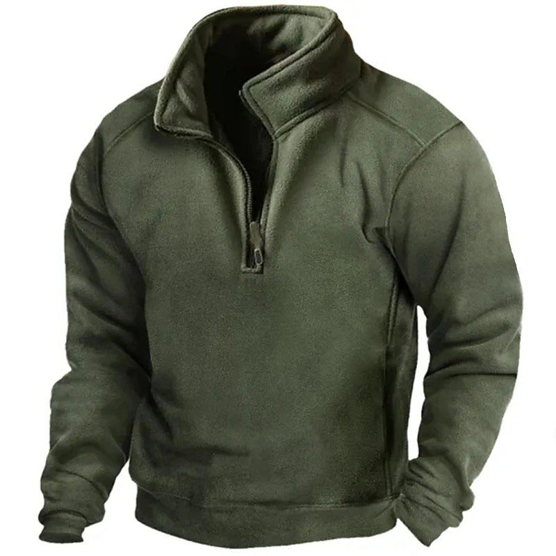 Green fleece pullover with a high collar on a white background